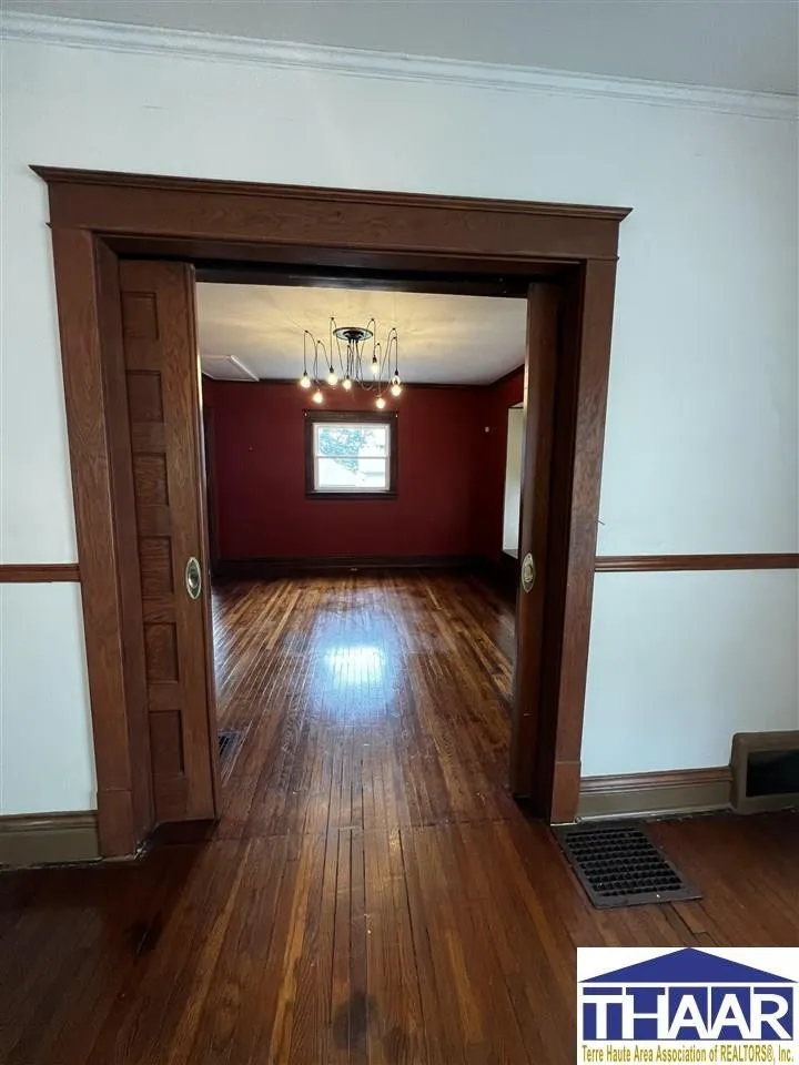 A view of the inside of a house from the hallway.